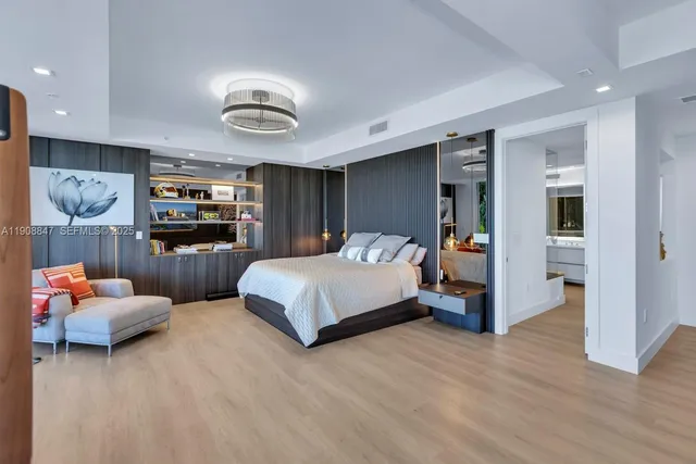 a view of a living room and dining room with furniture