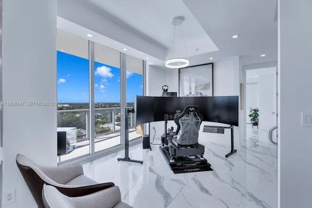 a view of balcony with wooden floor