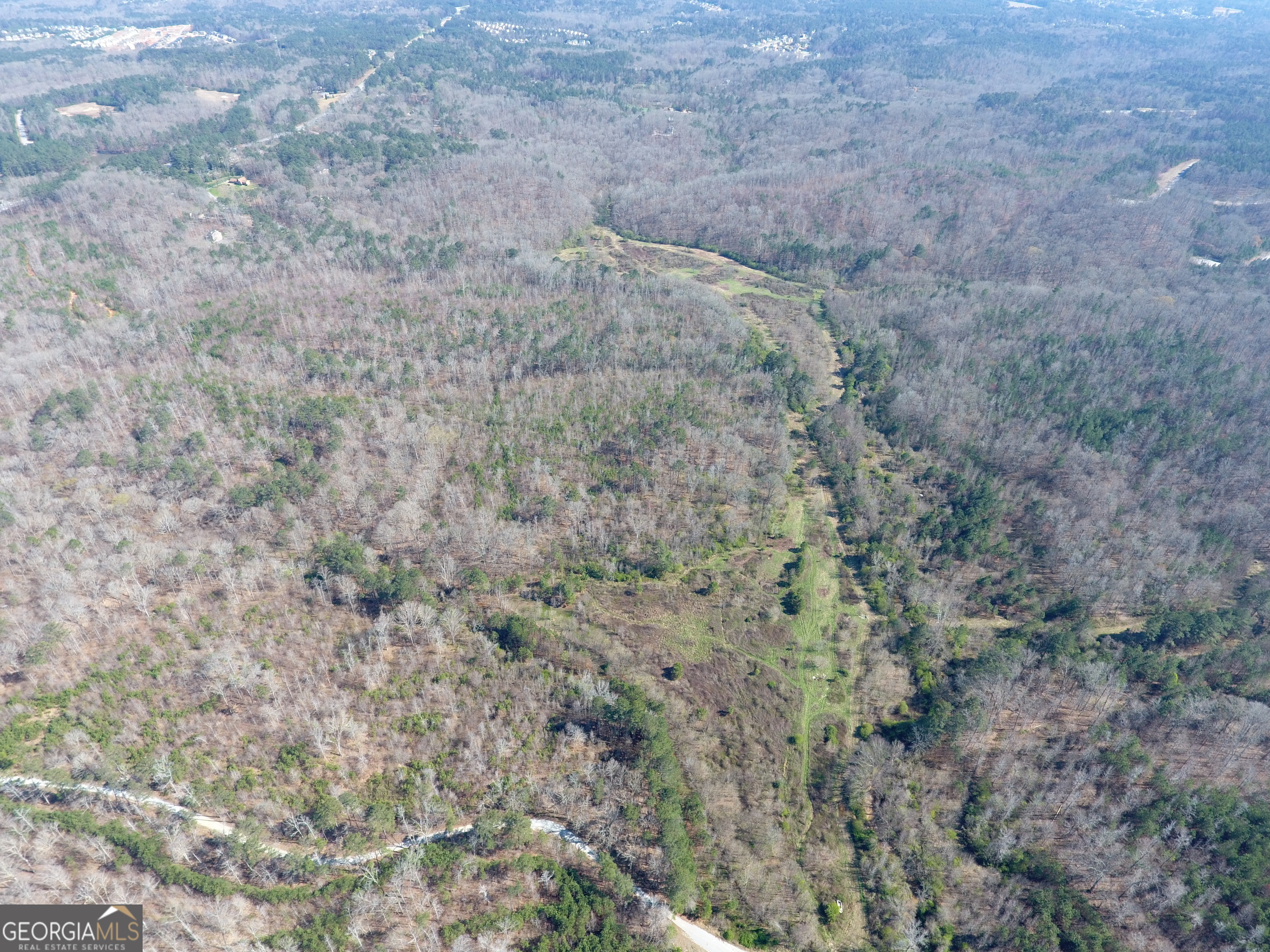 5455 Campbellton Fairburn Road Union City, GA 30213 - Photo 3 of 3 a view of a dry yard with green space