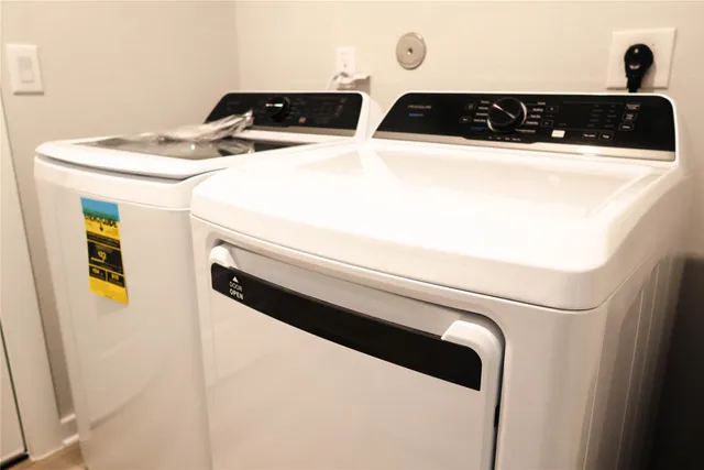 a kitchen with stainless steel appliances granite countertop a sink and a stove