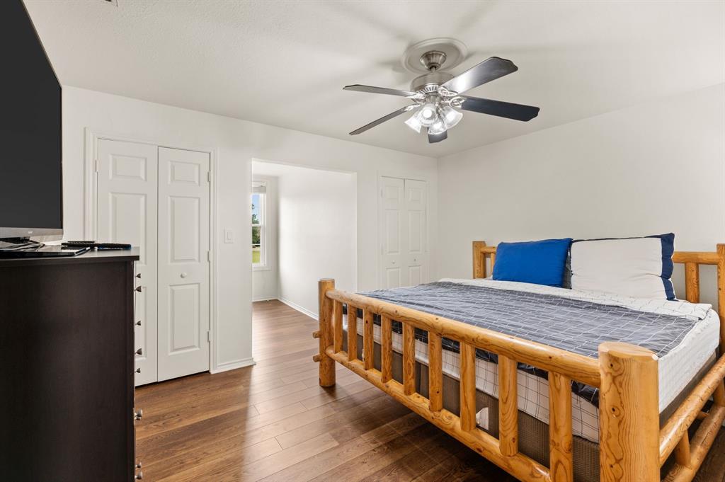 11 Country Ridge Road Melissa, TX 75454 - Photo 28 of 40 Bedroom #3 with two large closets on either side of the dormer.