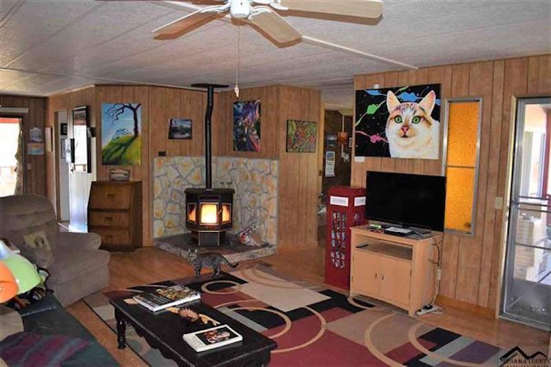 7395 Cardinal Road Corning, CA 96021 - Photo 3 of 15 Living room pellet stove