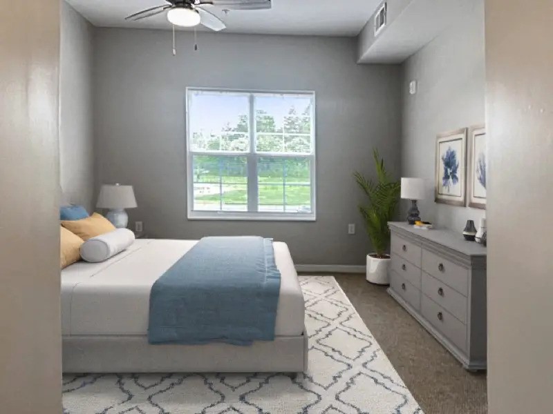 1009 East Dublin Granville Road, Unit 50 Columbus, OH 43229 - Photo 11 of 14 a bedroom with a bed and a window