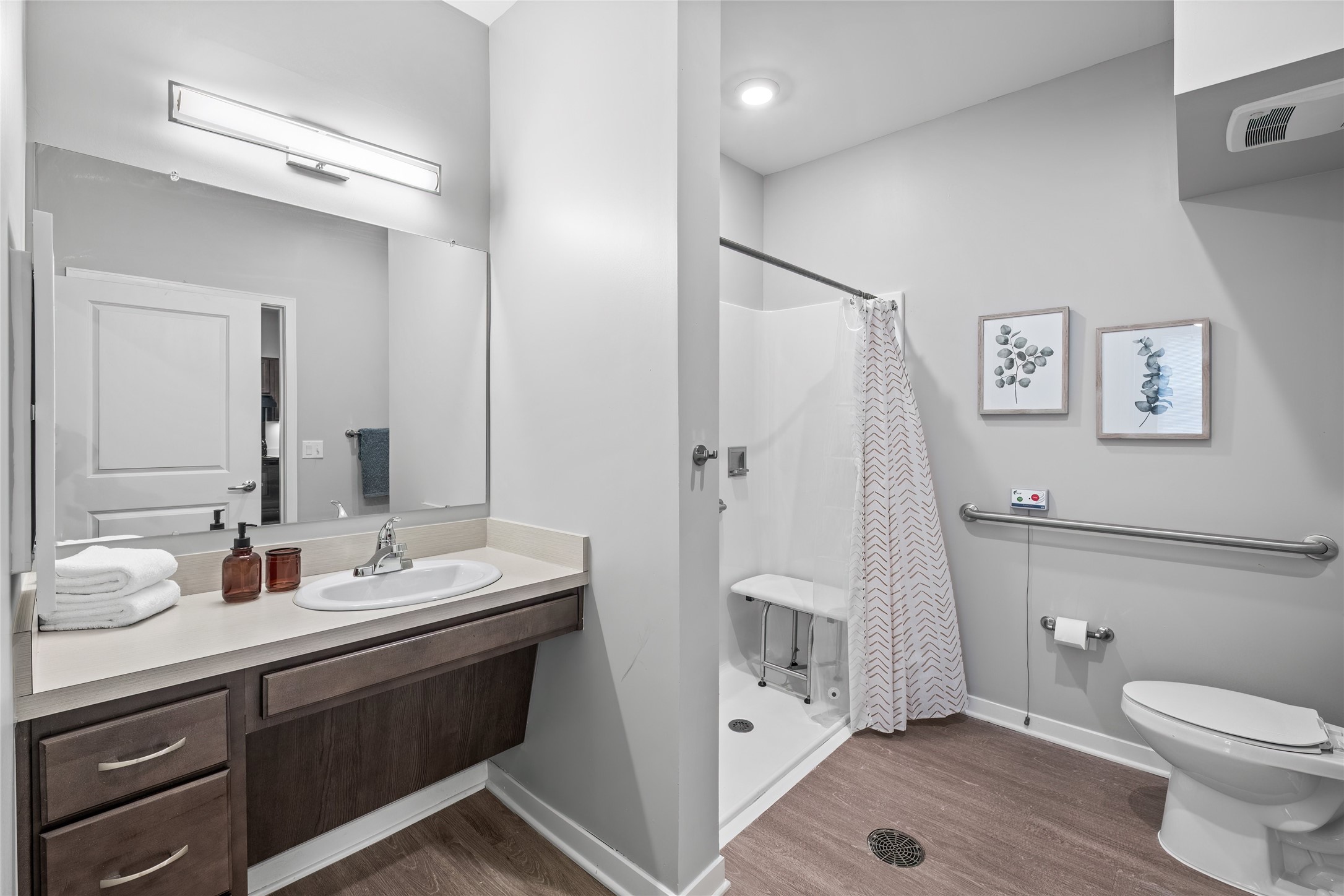 1009 East Dublin Granville Road, Unit 50 Columbus, OH 43229 - Photo 12 of 14 a bathroom with a sink a toilet and shower