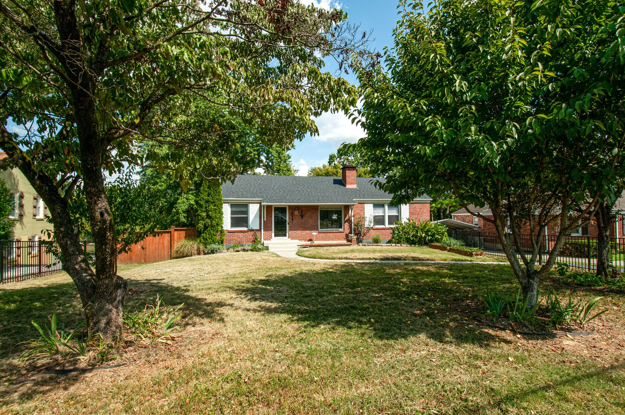 1021 Mitchell Road Nashville, TN 37206 - Photo 1 of 29 a front view of a house with a yard