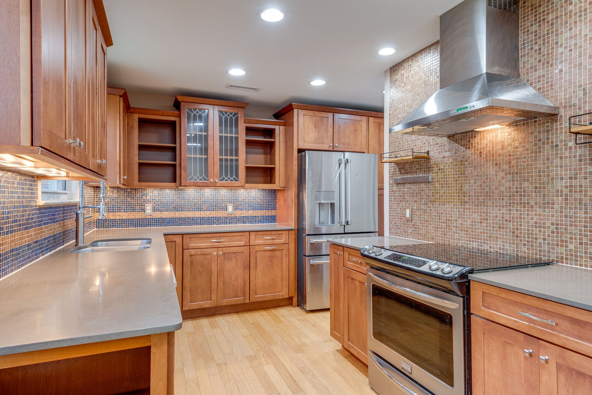 1021 Mitchell Road Nashville, TN 37206 - Photo 11 of 29 a kitchen with stainless steel appliances granite countertop a refrigerator and a stove top oven