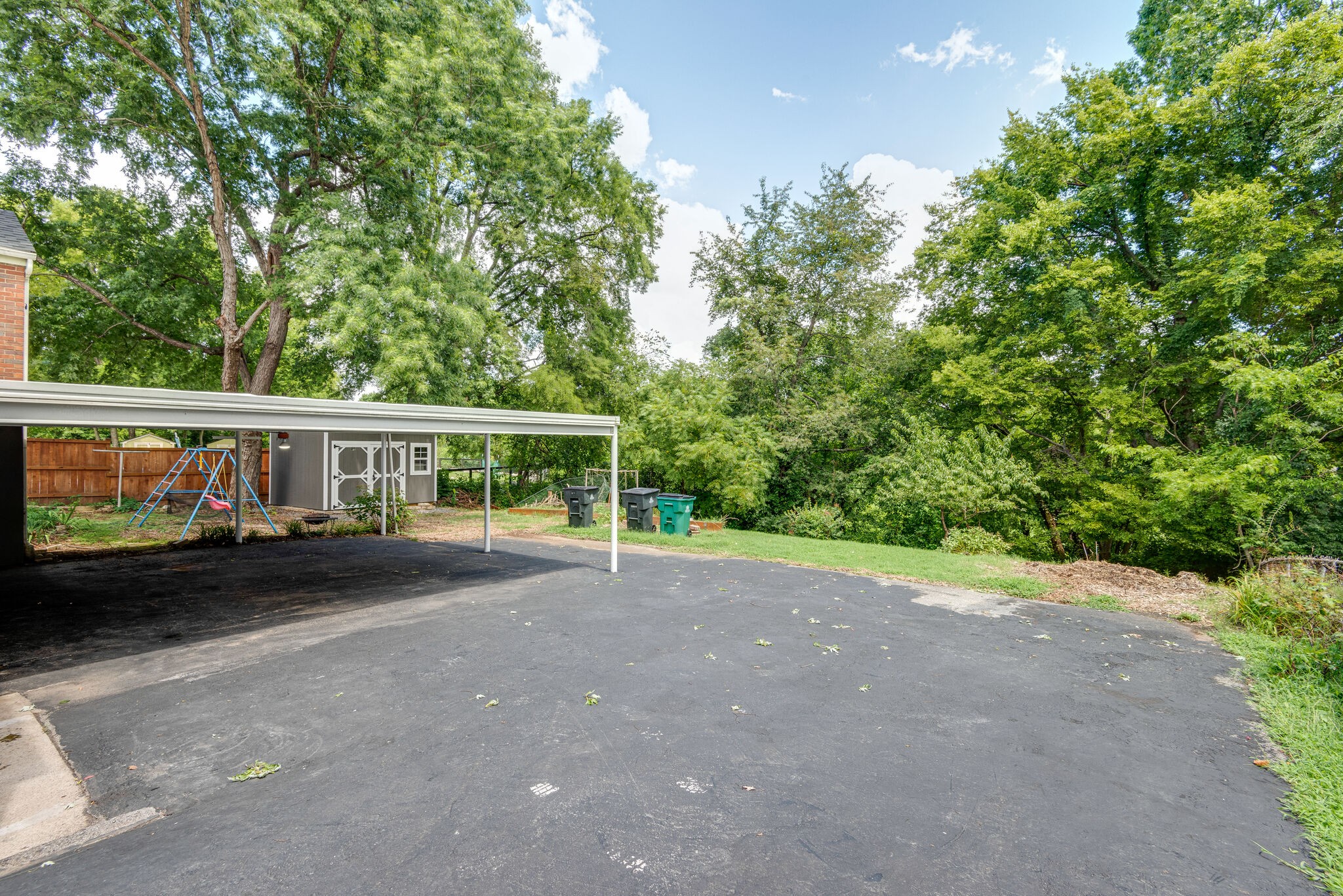 1021 Mitchell Road Nashville, TN 37206 - Photo 27 of 29 a view of a house with a yard and balcony