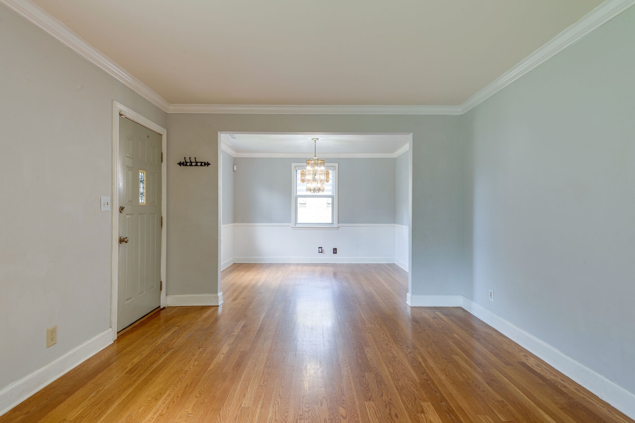 1021 Mitchell Road Nashville, TN 37206 - Photo 8 of 29 wooden floor in an empty room with a window