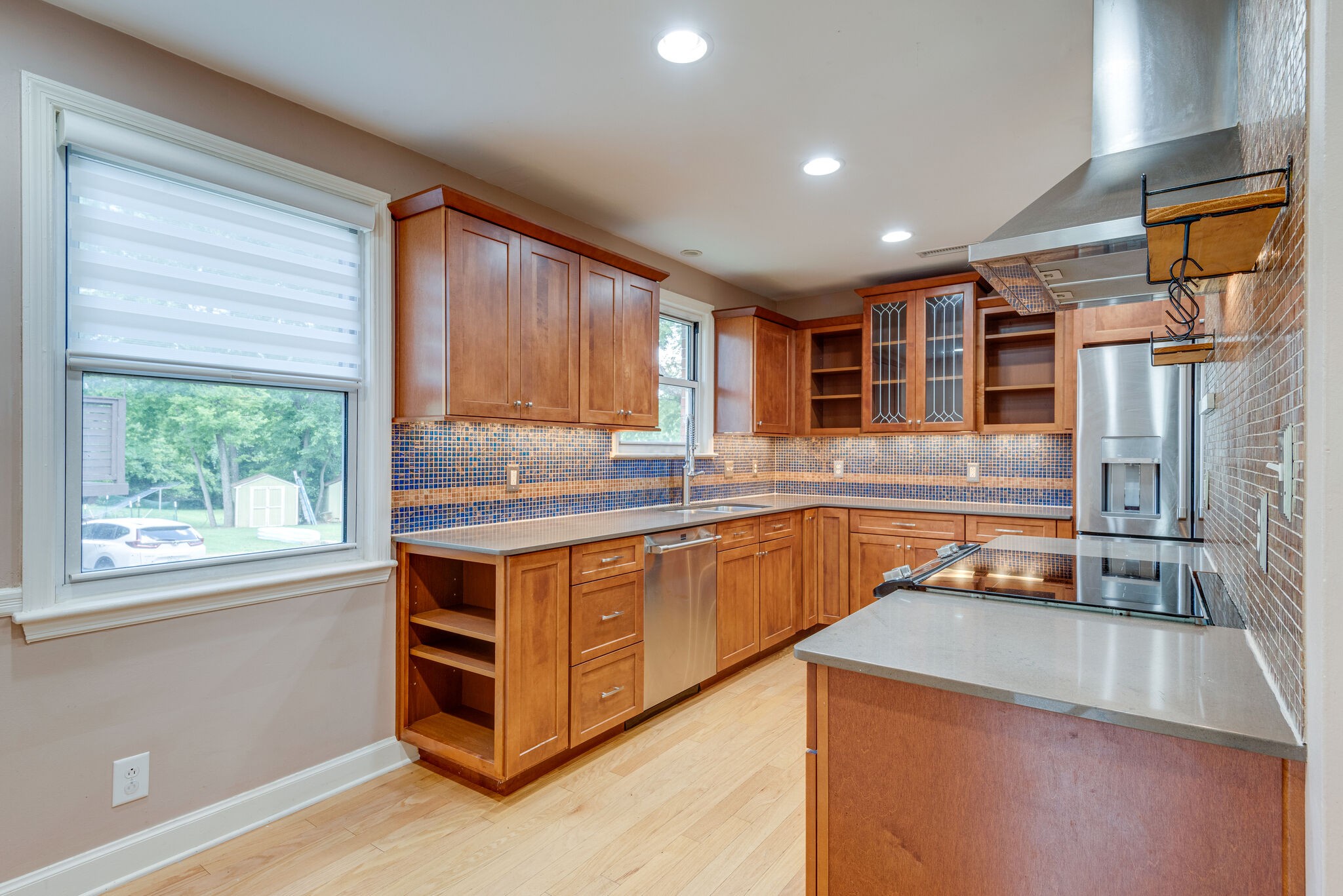 1021 Mitchell Road Nashville, TN 37206 - Photo 10 of 29 a kitchen with stainless steel appliances granite countertop a sink a stove and a refrigerator