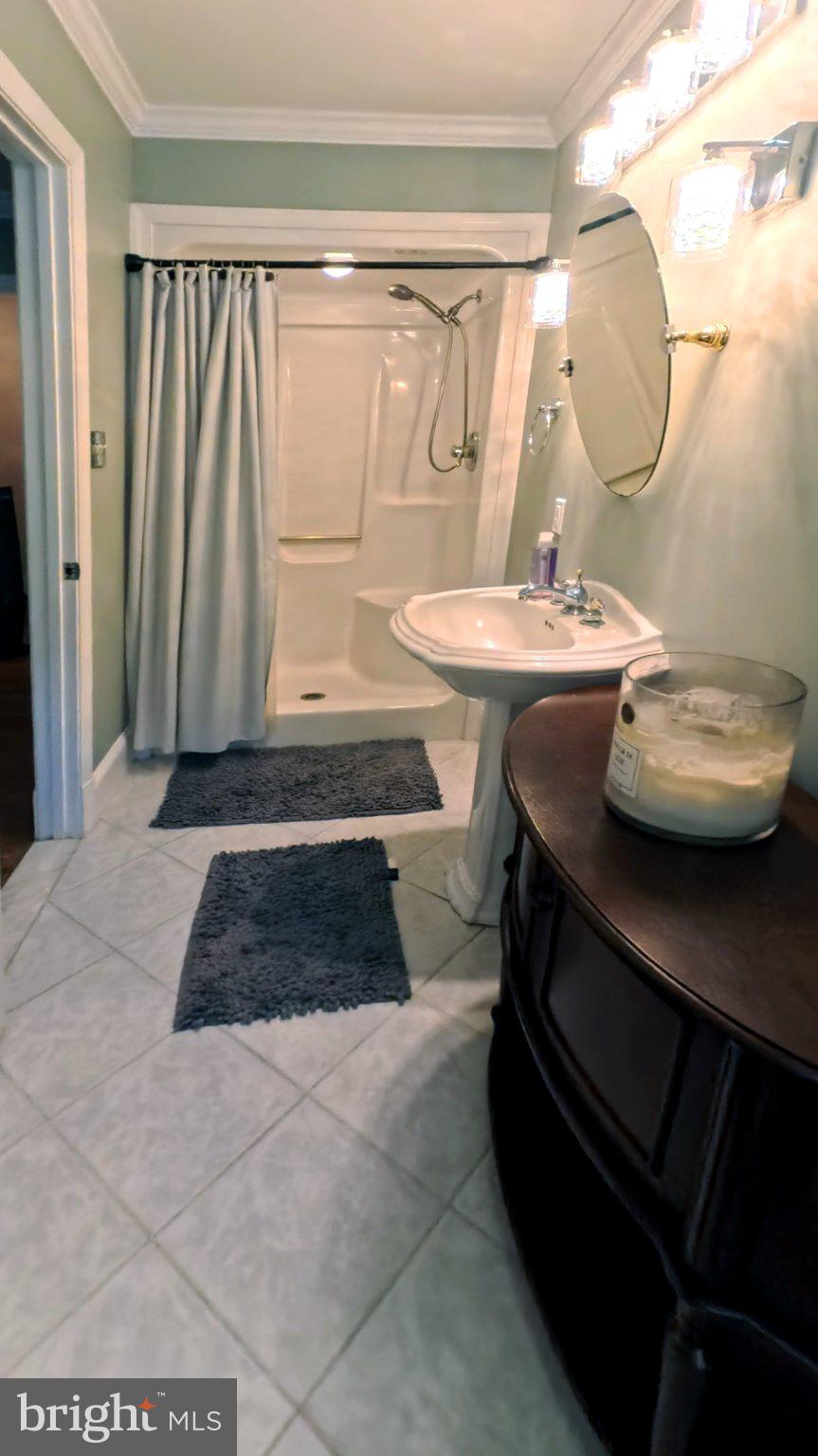 14705 Notley Road Silver Spring, MD 20905 - Photo 10 of 28 Charming bathroom with modern touches.