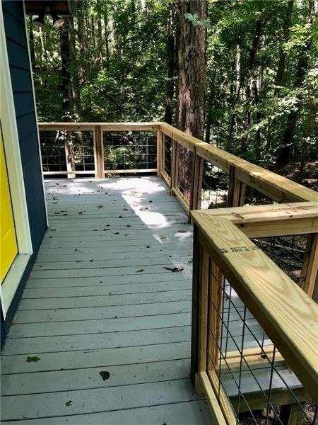 245 Hilton Way Canton, GA 30114 - Photo 12 of 13 a view of balcony with wooden floor and seating space