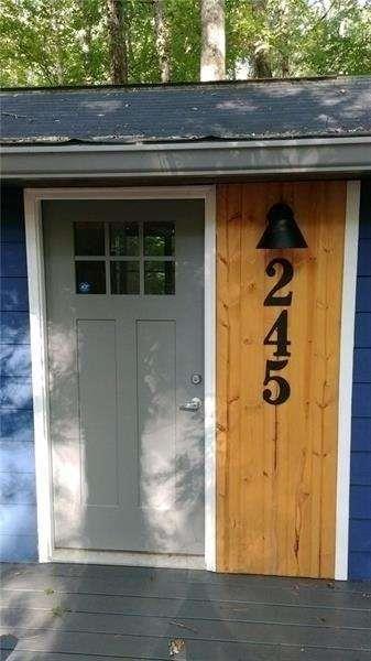 245 Hilton Way Canton, GA 30114 - Photo 4 of 13 a view of a door of the house