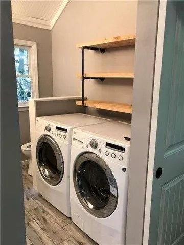a utility room with dryer and washer