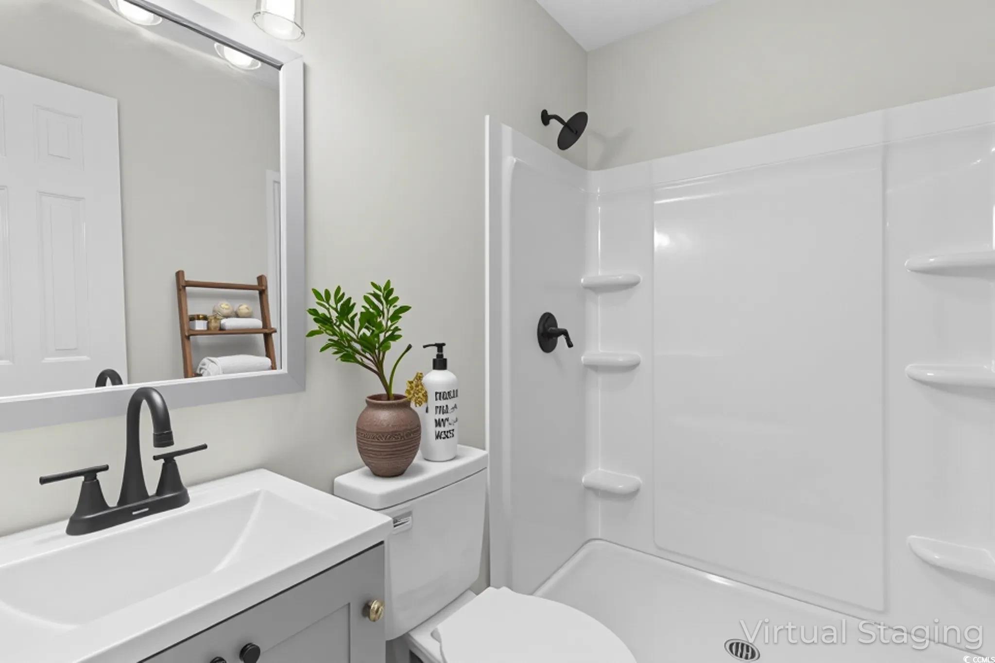 1712 Singleton Street Conway, SC 29527 - Photo 23 of 40 Bathroom with vanity and a shower