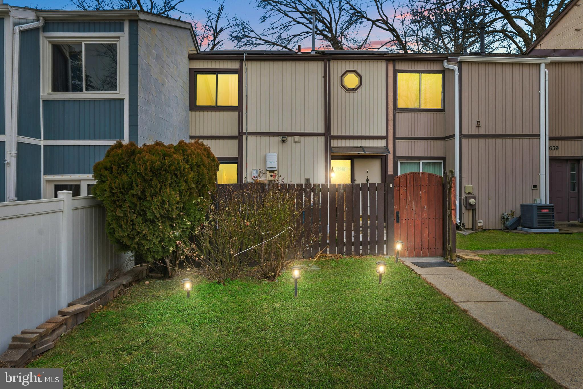 a view of a back yard of the house