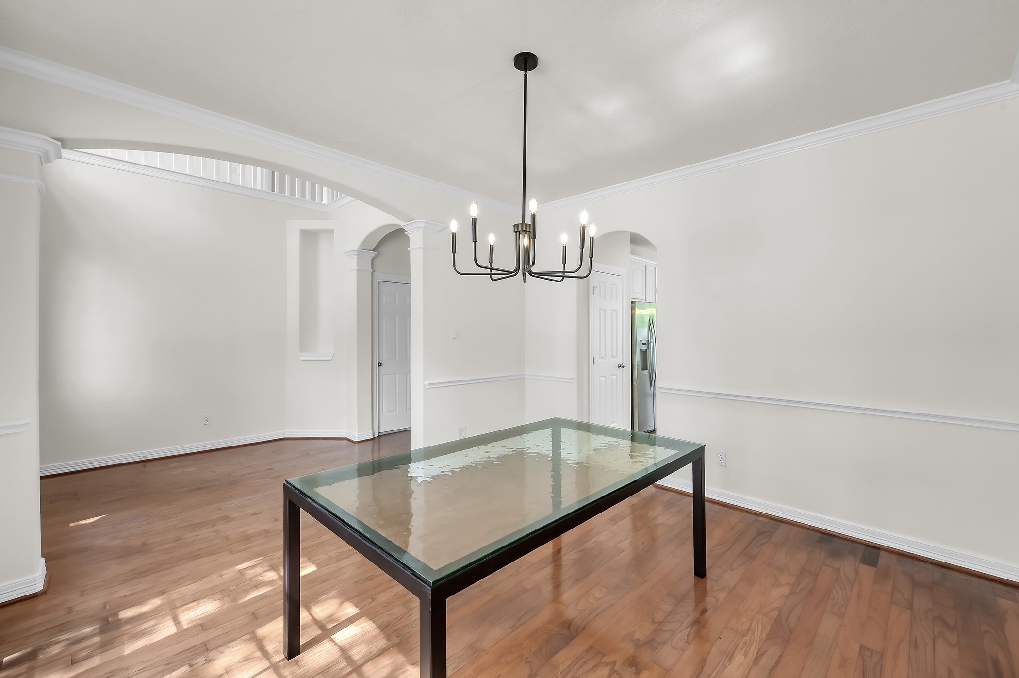 18310 Rittenhouse Park Court Spring, TX 77379 - Photo 7 of 35 Boasting crown molding, fresh paint, new light fixture.