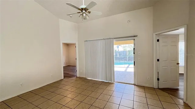 a view of an empty room and window