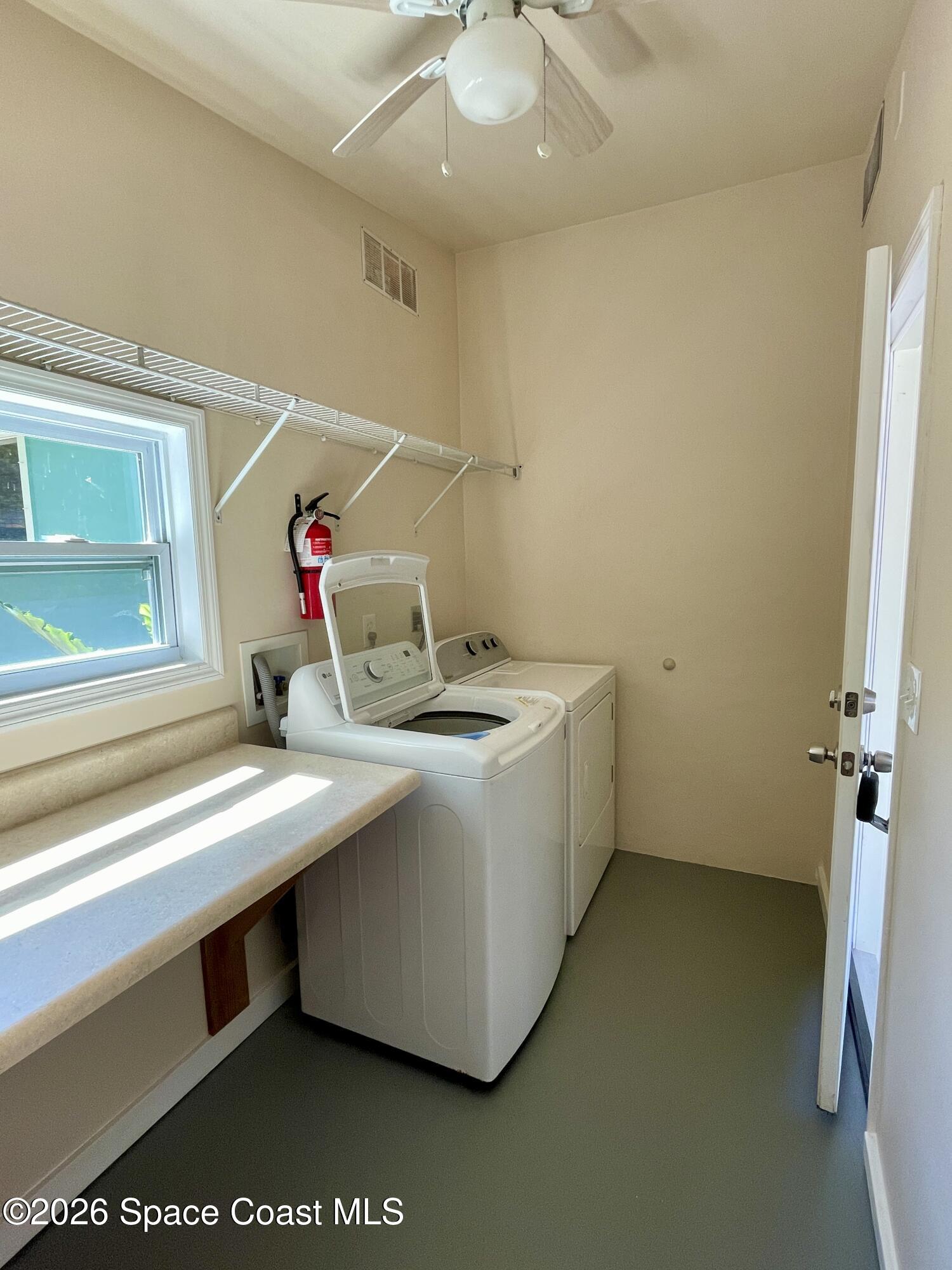 7260 Blue Shore Road Grant, FL 32949 - Photo 23 of 23 Laundry room off carport