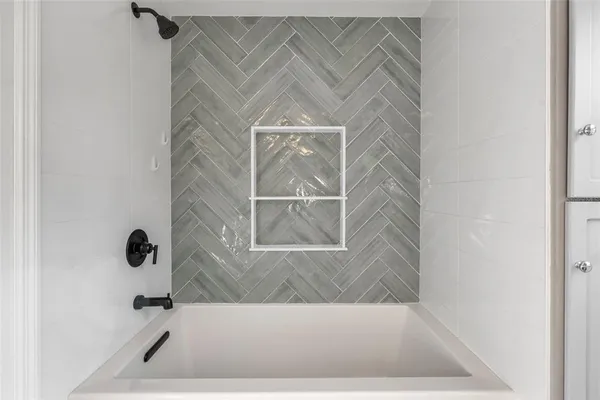 a bathroom with a bathtub