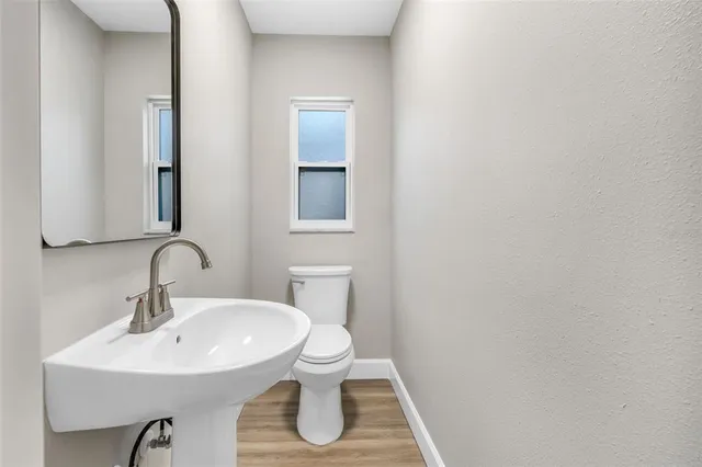 a bathroom with a sink and a toilet