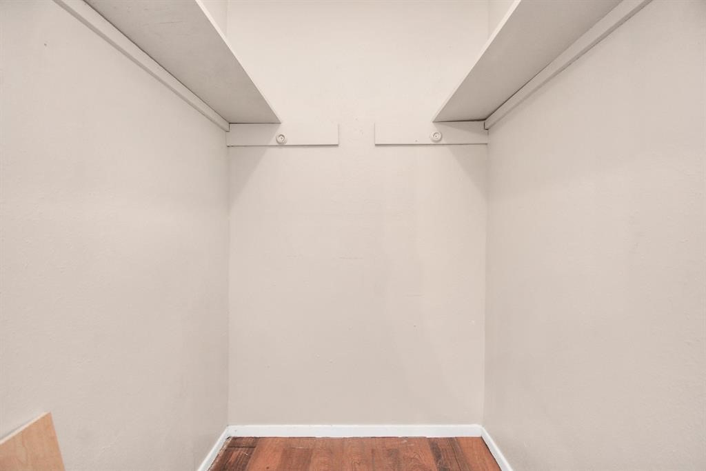 4803 Beechaven Street Houston, TX 77053 - Photo 17 of 30 a view of small space with racks on the wall