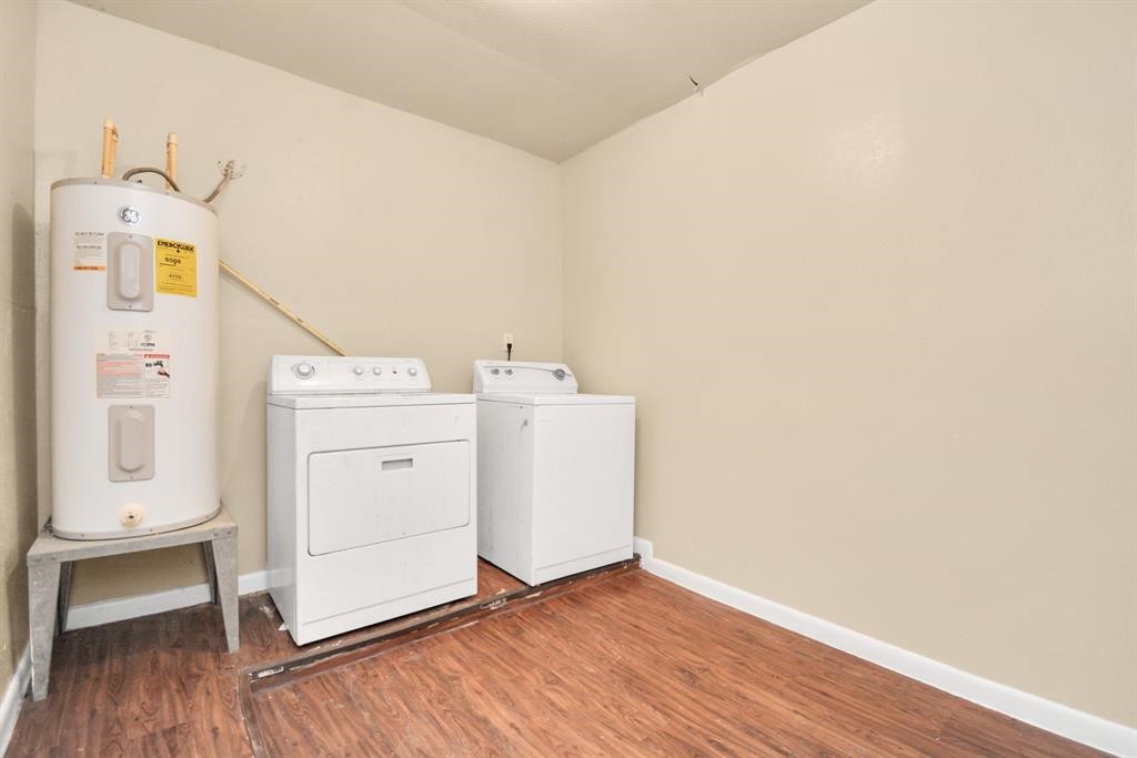 4803 Beechaven Street Houston, TX 77053 - Photo 22 of 30 a utility room with dryer and washer