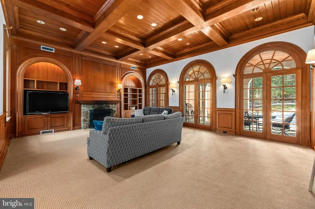 a view of a livingroom with furniture and a fireplace
