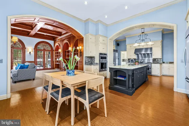 a spacious bedroom with a bed and a fireplace