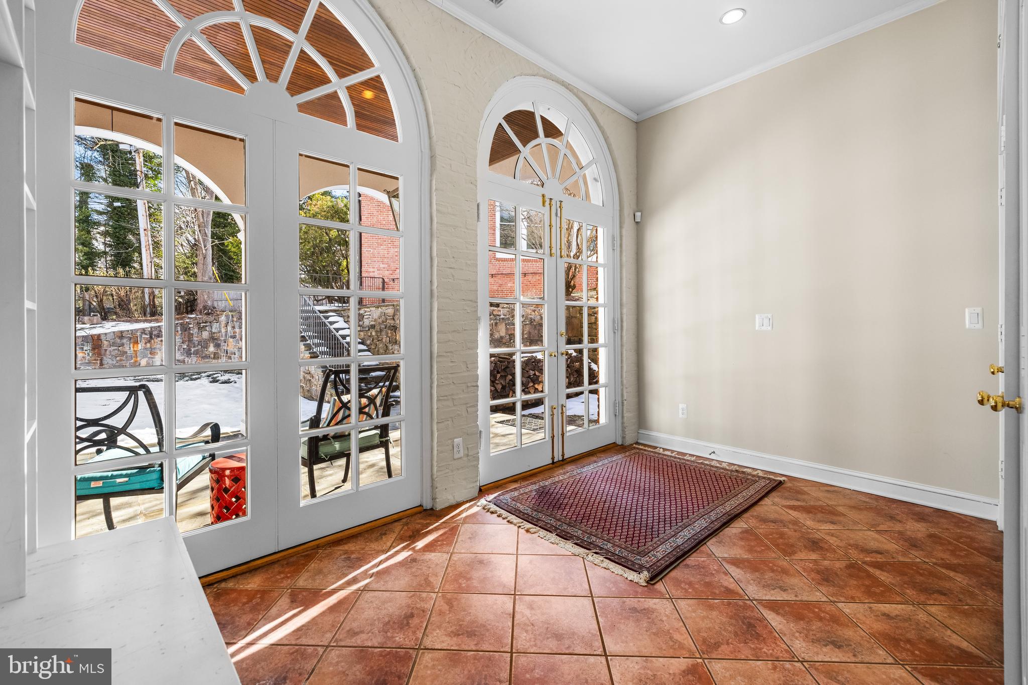 20 Blythewood Road Baltimore, MD 21210 - Photo 38 of 95 a view of an entryway with a floor to ceiling window and outside view