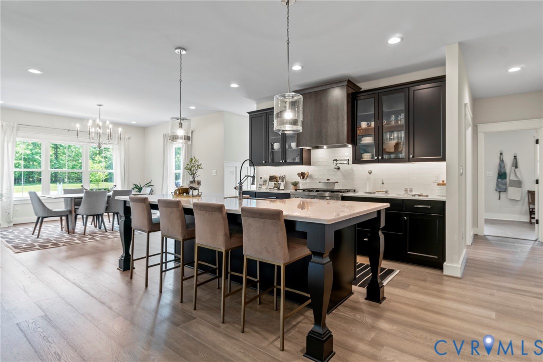 3076 Braehead Road Powhatan, VA 23139 - Photo 11 of 41 a large kitchen with a table and chairs
