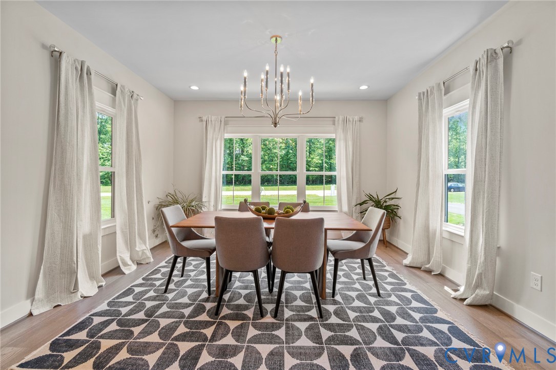 3076 Braehead Road Powhatan, VA 23139 - Photo 13 of 41 a view of a dining room with furniture window and outside view