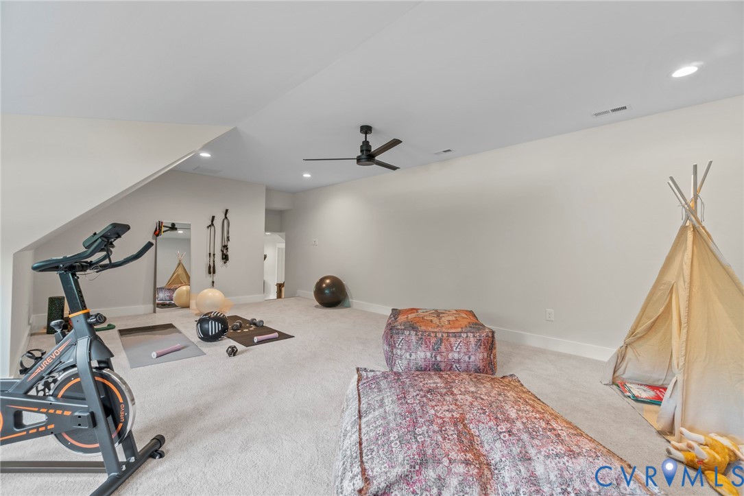 3076 Braehead Road Powhatan, VA 23139 - Photo 26 of 41 a view of a room with gym equipment
