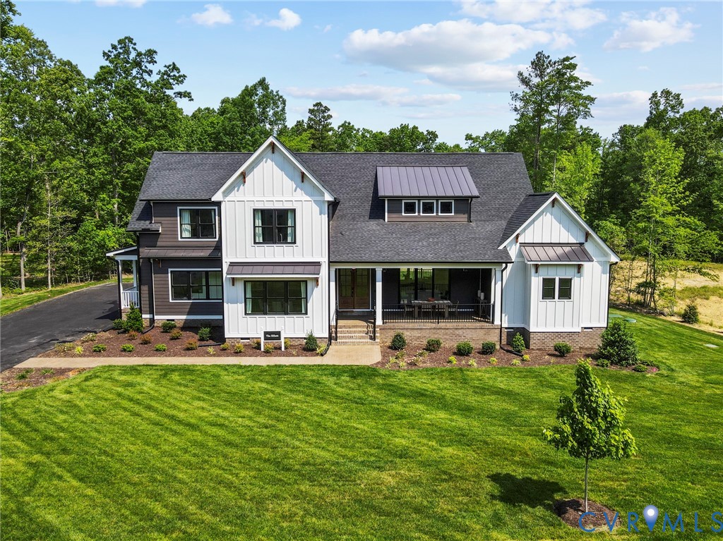 3076 Braehead Road Powhatan, VA 23139 - Photo 35 of 41 a front view of a house with garden