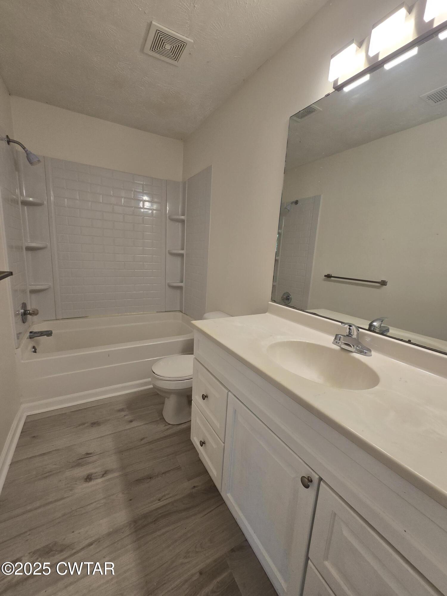 494 Mifflin Road Jackson, TN 38301 - Photo 6 of 11 a bathroom with a sink a toilet and shower