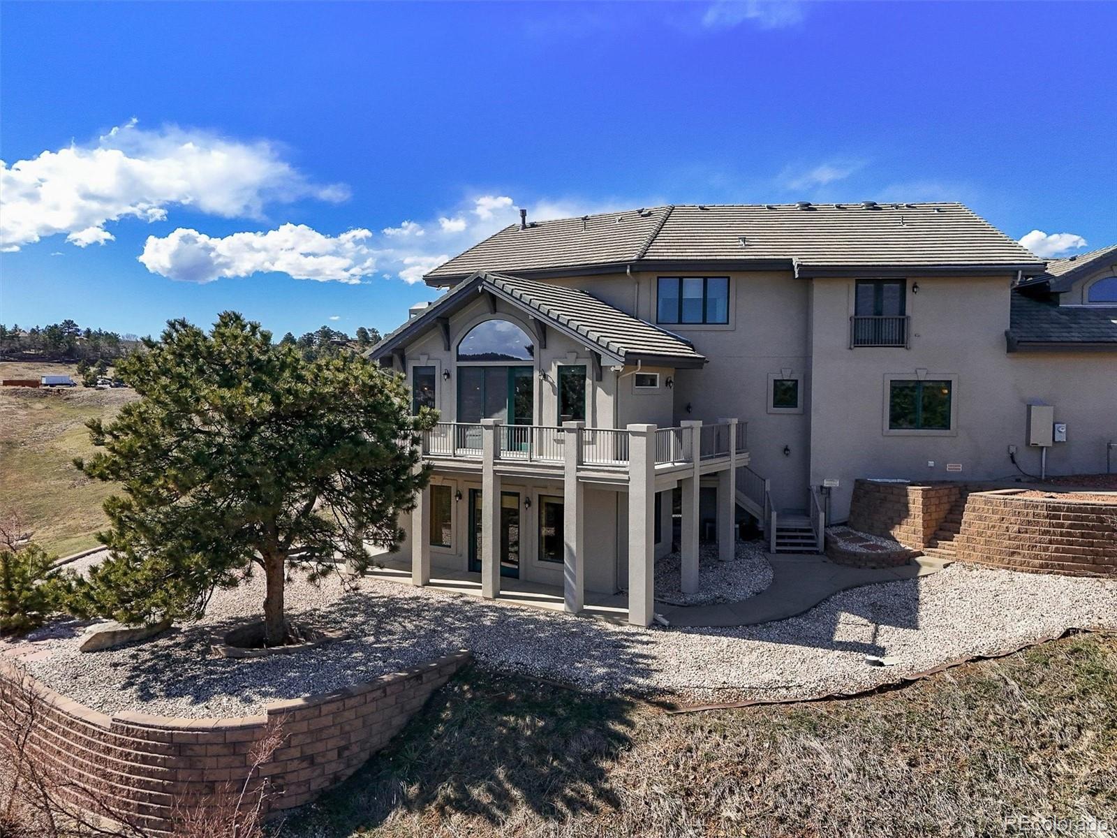 156 South Lookout Mountain Road Golden, CO 80401 - Photo 19 of 50 a view of a house with a patio
