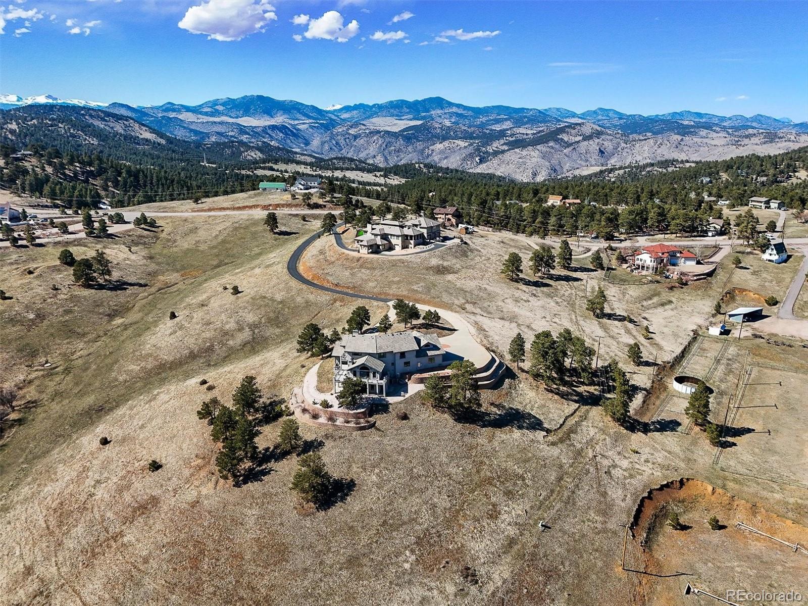 156 South Lookout Mountain Road Golden, CO 80401 - Photo 46 of 50 a view of a town with mountains in the background