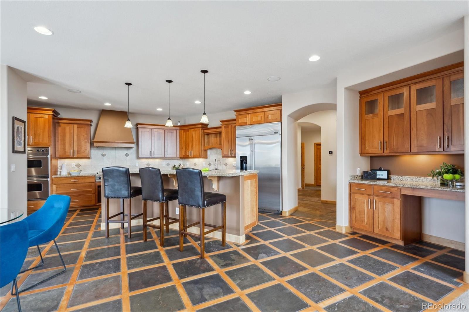 156 South Lookout Mountain Road Golden, CO 80401 - Photo 5 of 50 a kitchen with stainless steel appliances kitchen island granite countertop a sink and a cabinets