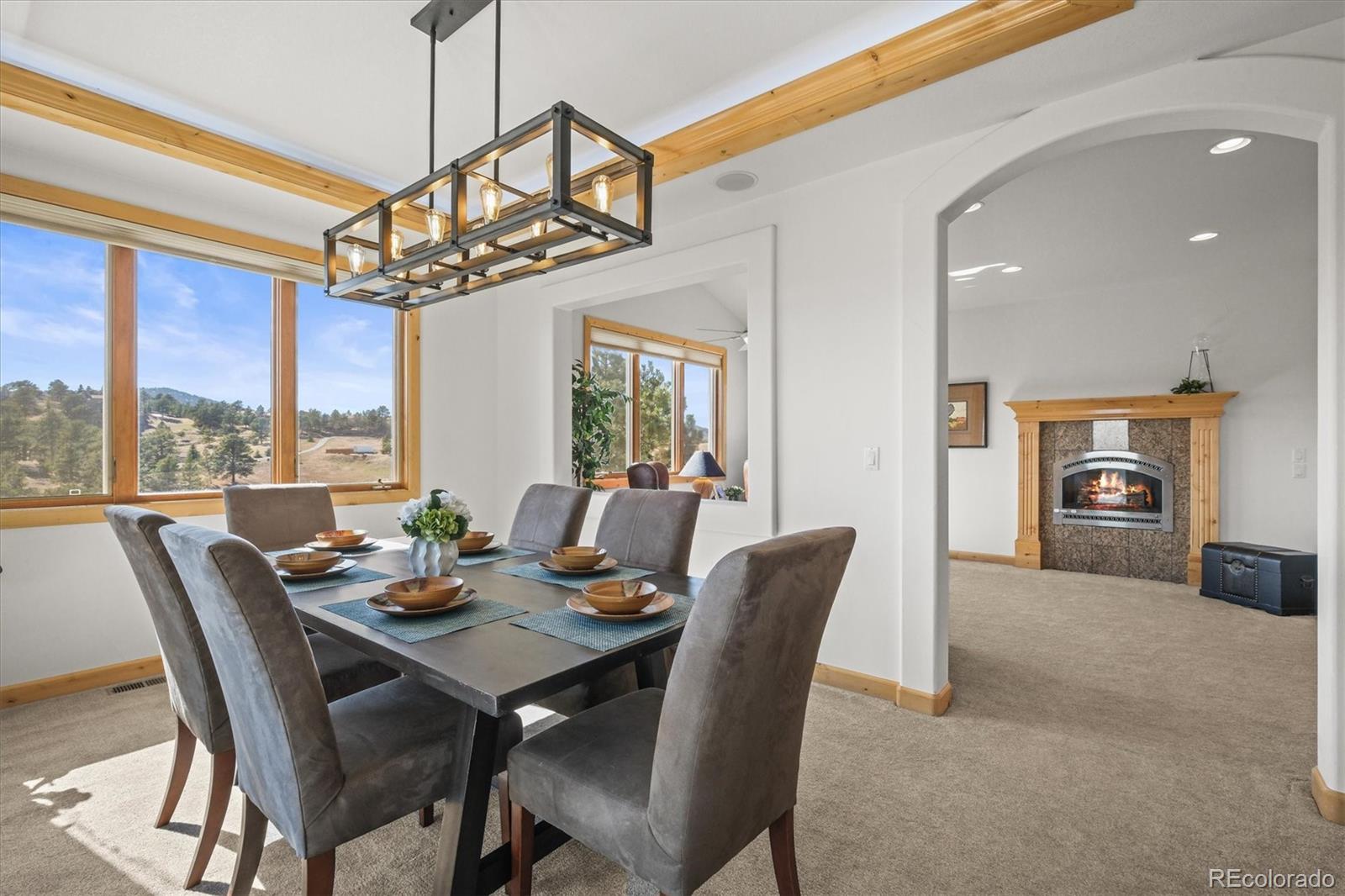 156 South Lookout Mountain Road Golden, CO 80401 - Photo 8 of 50 a view of a dining room with furniture window and outside view