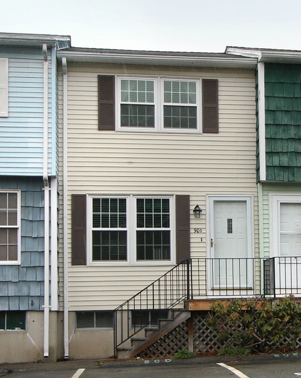 90 Roper Street, Unit D Lowell, MA 01852 - Photo 1 of 17 a front view of a house