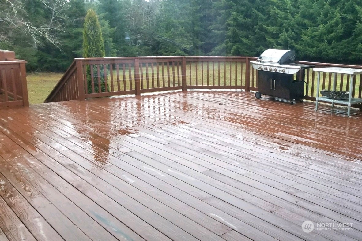 976 Ocean Beach Road Hoquiam, WA 98550 - Photo 24 of 34 a view of deck with wooden floor and fence