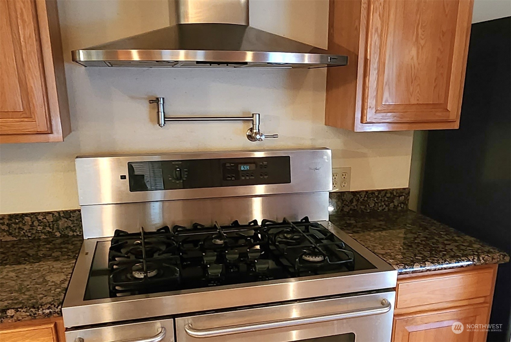 976 Ocean Beach Road Hoquiam, WA 98550 - Photo 6 of 34 a close view of a stove top oven sitting inside of a kitchen