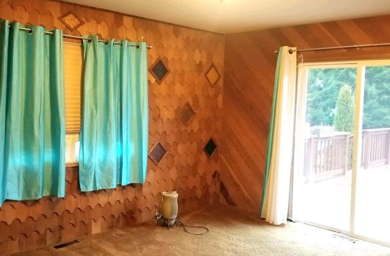 976 Ocean Beach Road Hoquiam, WA 98550 - Photo 10 of 34 a view of backyard with a garden and plants