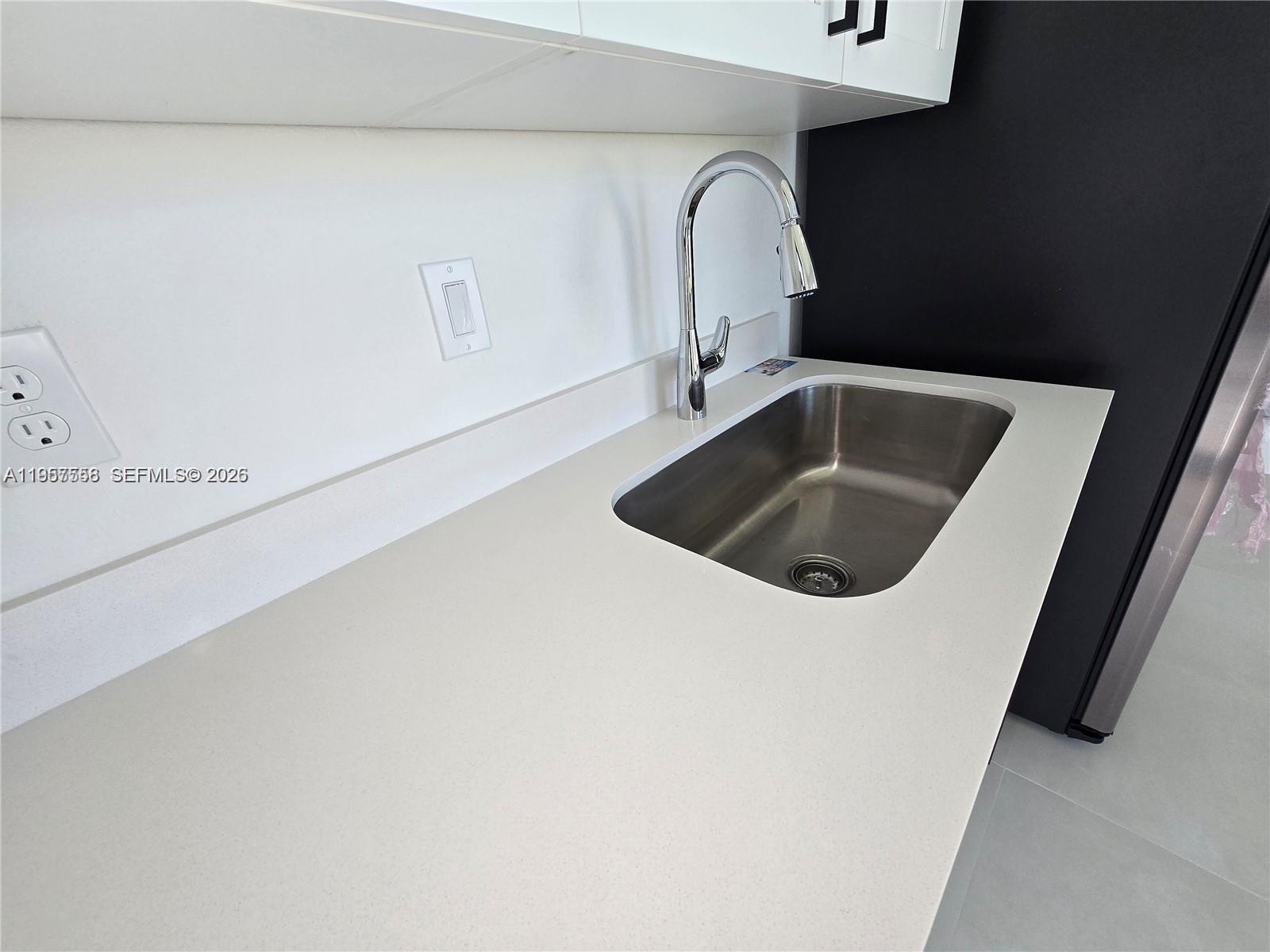 19534 Southwest 324th Street Homestead, FL 33030 - Photo 34 of 86 a close view of sink and tap