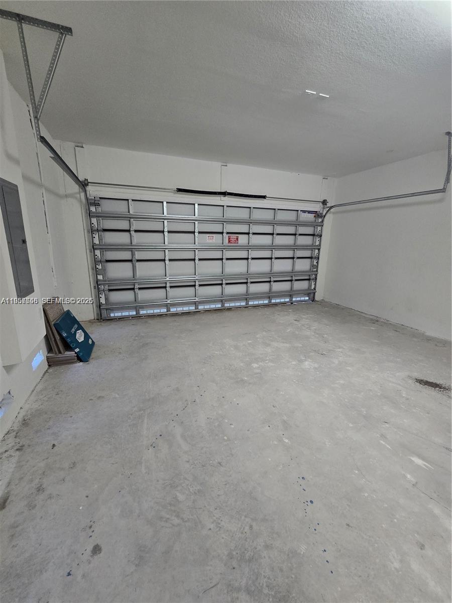 19534 Southwest 324th Street Homestead, FL 33030 - Photo 79 of 86 a view of a garage