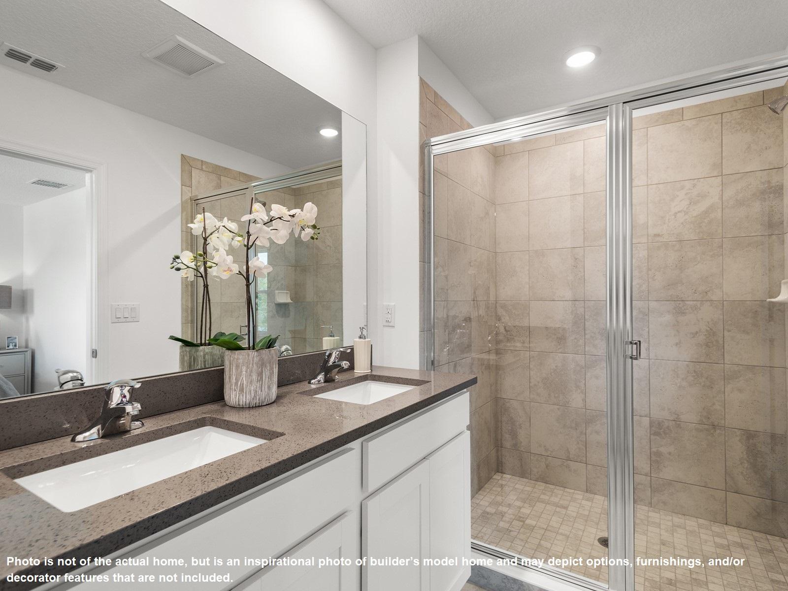 396 Southeast Sea Hunt Way Stuart, FL 34994 - Photo 5 of 10 a bathroom with double vanity sinks and a mirror