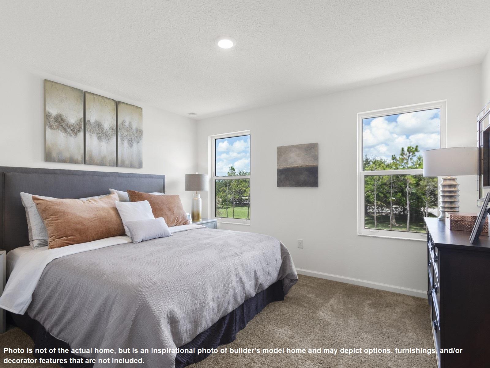 396 Southeast Sea Hunt Way Stuart, FL 34994 - Photo 6 of 10 a bedroom with a bed and windows