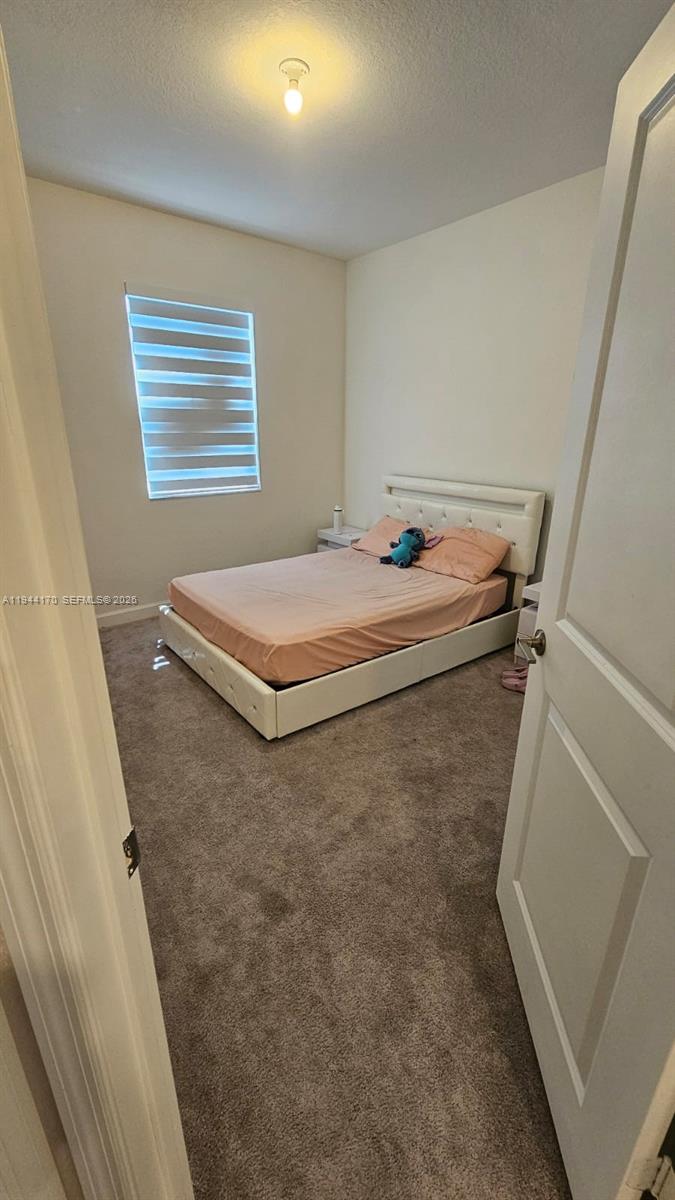 1146 Southeast 26th Street Homestead, FL 33035 - Photo 22 of 42 a room with pool table and window