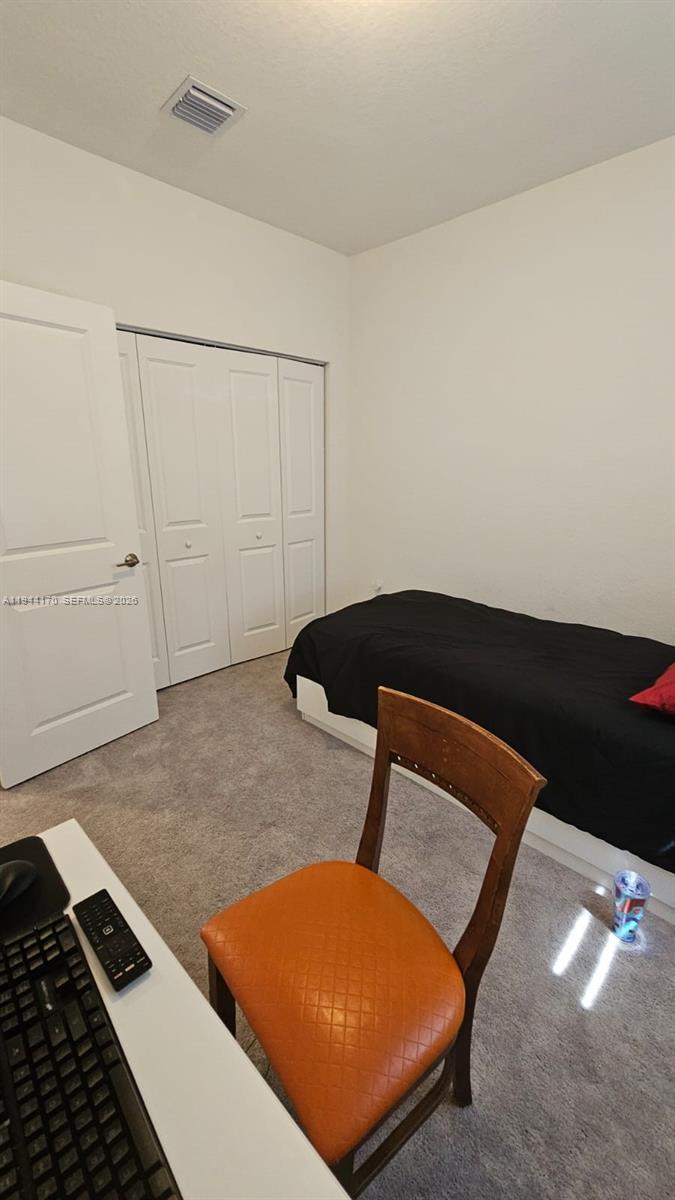 1146 Southeast 26th Street Homestead, FL 33035 - Photo 23 of 42 a sitting area with an empty room