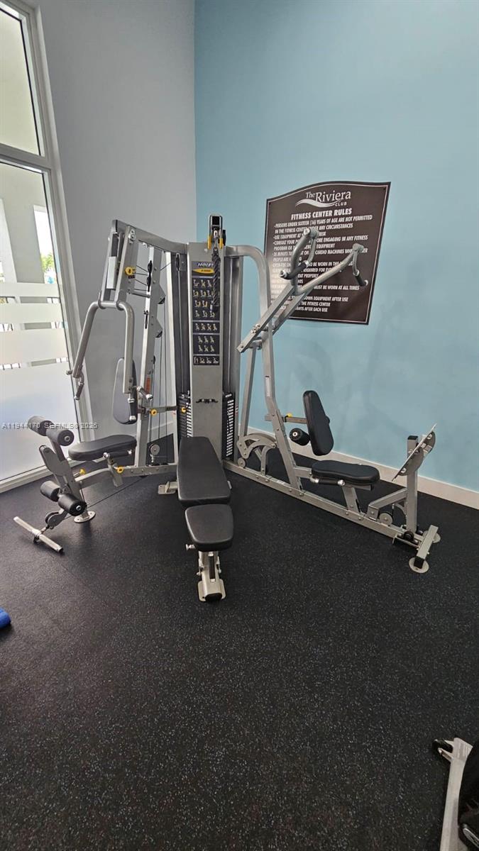 1146 Southeast 26th Street Homestead, FL 33035 - Photo 41 of 42 a view of a room with gym equipment