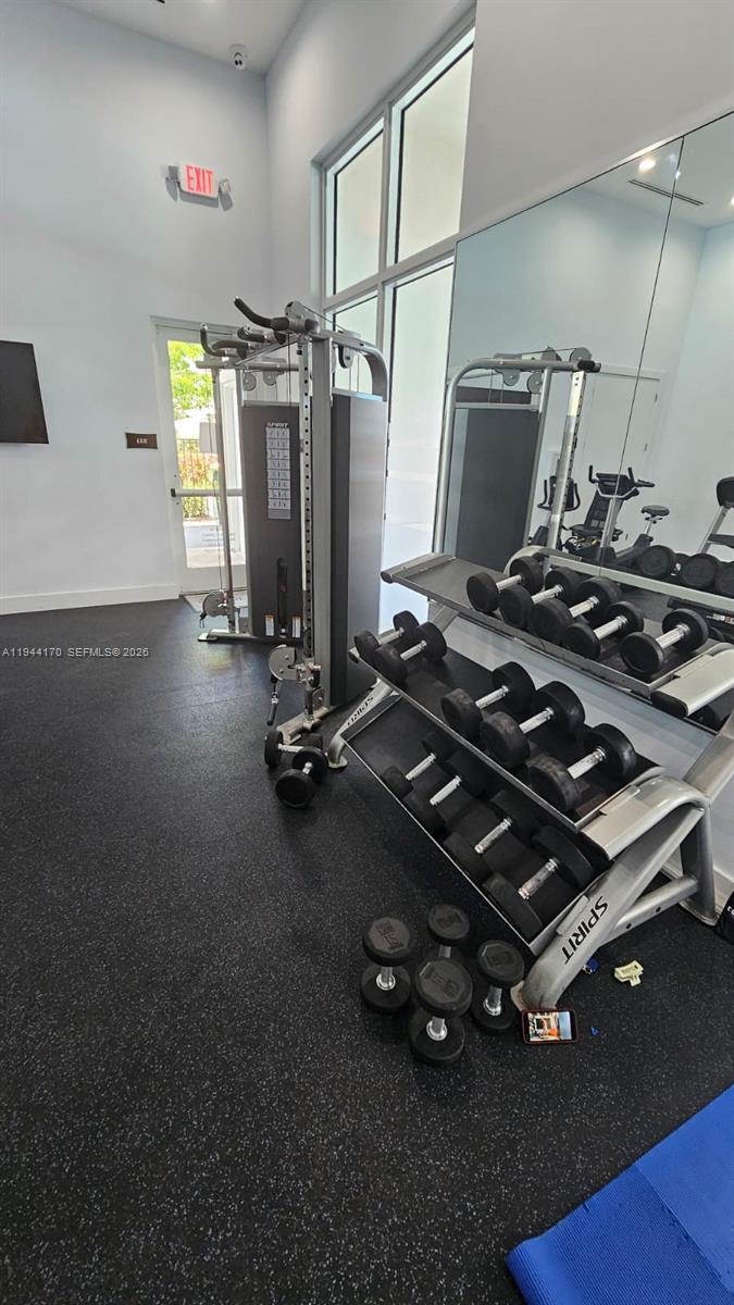 1146 Southeast 26th Street Homestead, FL 33035 - Photo 42 of 42 a room with gym equipment